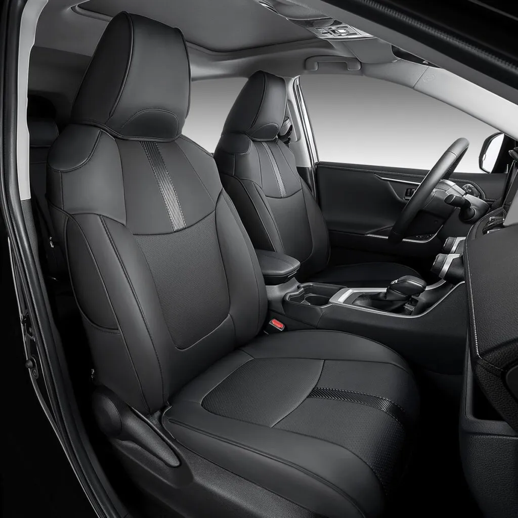 Custom-fit black leather seat covers with perforated design for Toyota RAV4 front seats.